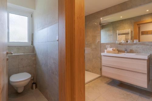 Koupelna v ubytování SR Apartments GmbH Rabitschhof
