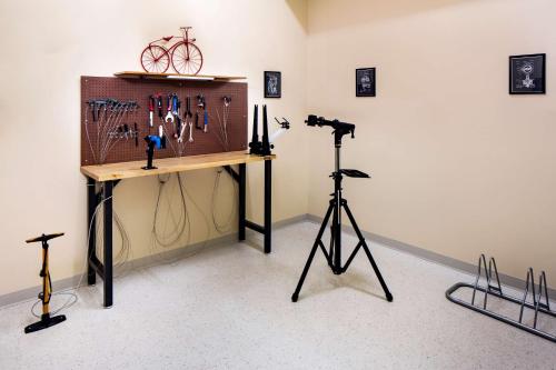a room with a table with a camera on a tripod at Hyatt Place Moab in Moab