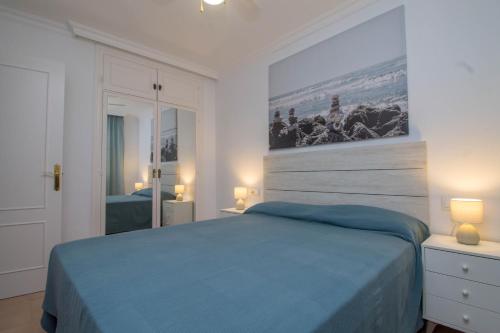 Cama o camas de una habitación en Imperial Puerto 2 3E By IVI Real Estate