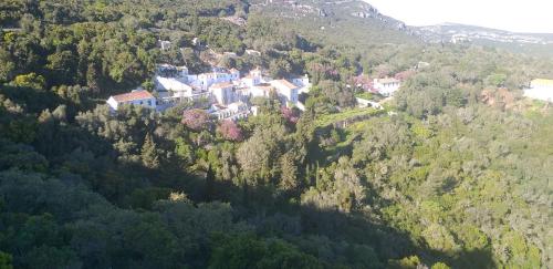 an aerial view of a house on a mountain at Páteo memória, casa do beco in Setúbal