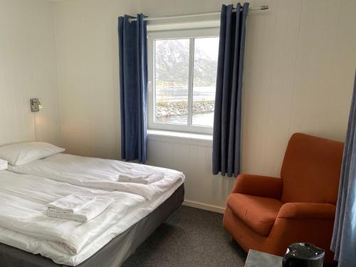 Un ou plusieurs lits dans un hébergement de l'établissement Fast Hotel Henningsvær