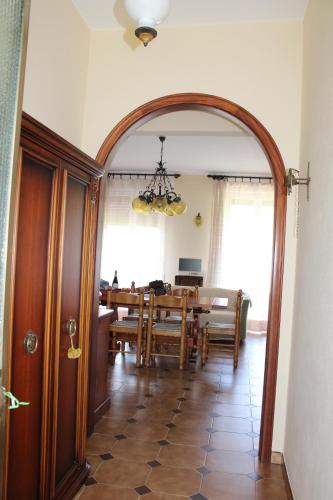 a dining room with a table and a dining roomiasm sidx sidx sidx at Villa ELENA in Mezzanego