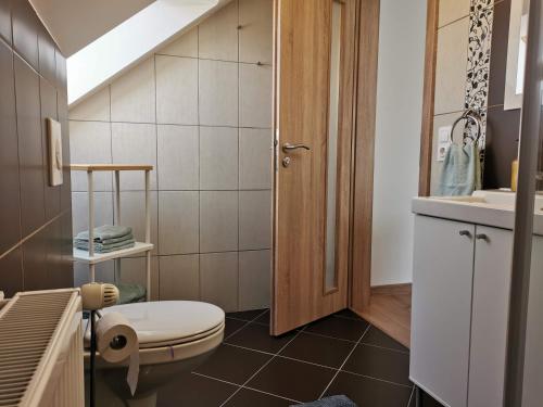 Kúpeľňa v ubytovaní Dália Apartman