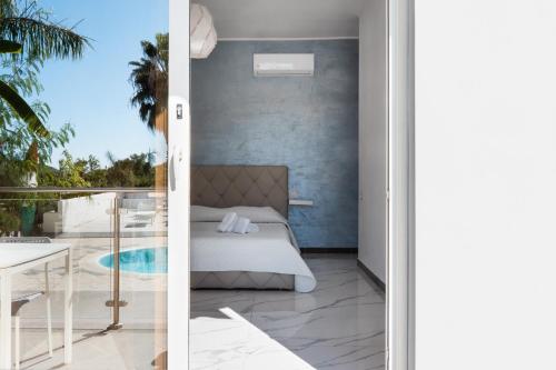 Postel nebo postele na pokoji v ubytování B&B El Dorado