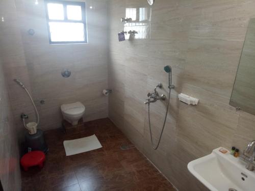 Ένα μπάνιο στο Chinmaye Inn