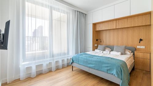 Postel nebo postele na pokoji v ubytování Portova - BillBerry Apartments