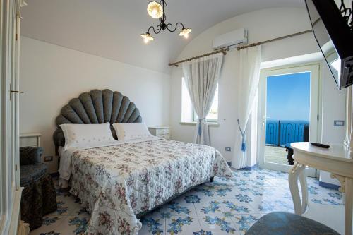A bed or beds in a room at Villa Primavera