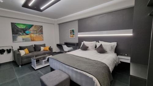 Postel nebo postele na pokoji v ubytování LUXSUITES