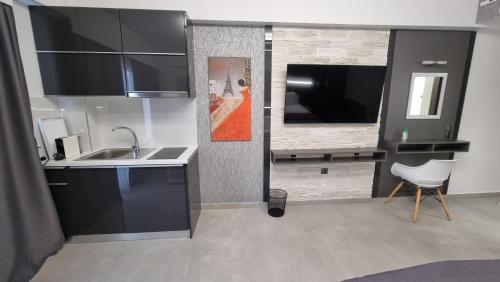 LUXSUITESにあるキッチンまたは簡易キッチン