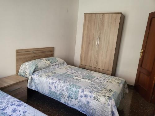 Postel nebo postele na pokoji v ubytování Apartamento San Andres