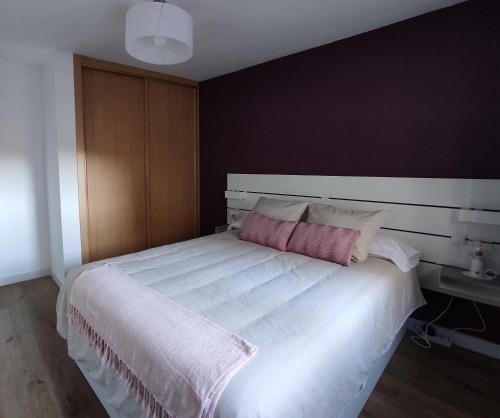 A bed or beds in a room at El Rincón del Alma Mía