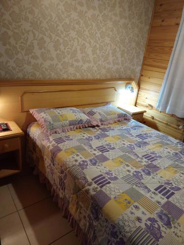 Katil atau katil-katil dalam bilik di Pousada Villa Fiorita
