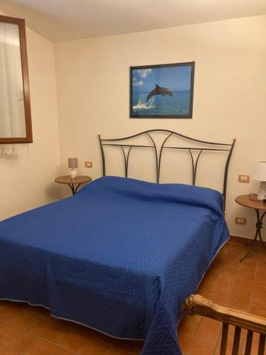 Postel nebo postele na pokoji v ubytování Appartamenti Podere 270