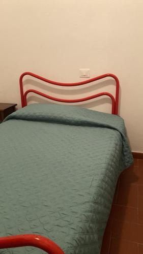 Ένα ή περισσότερα κρεβάτια σε δωμάτιο στο Appartamenti Podere 270