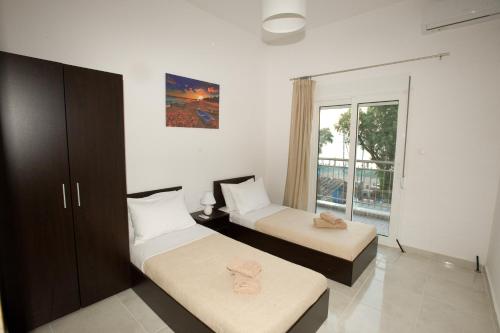 Postel nebo postele na pokoji v ubytování Sea Gem Apartment 1