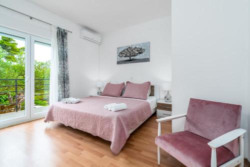 Posteľ alebo postele v izbe v ubytovaní Holiday House Josip