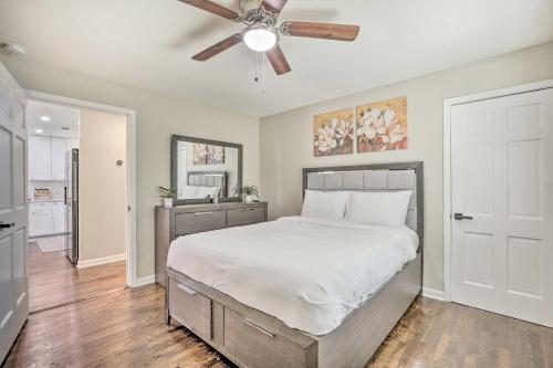 a bedroom with a bed and a ceiling fan at World Cup Base Less Than 3 Mi to Mercedes-Benz Stadium! in Atlanta