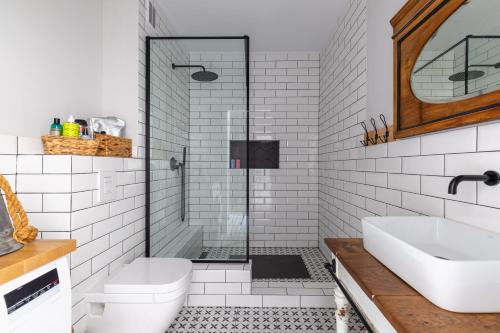 Koupelna v ubytování Apartament Bulvar Premium Starówka