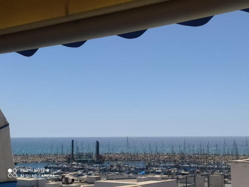 a view of the ocean from a building at סוויטה מול הים in Ashqelon