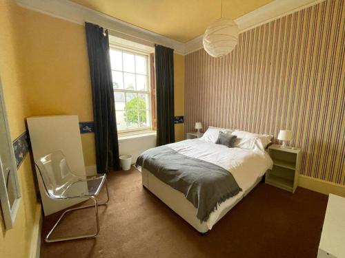Krevet ili kreveti u jedinici u okviru objekta 4 Bedroom House in the Heart of St Andrews