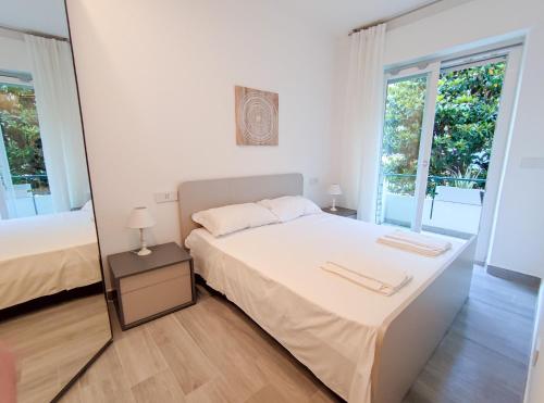 Ένα ή περισσότερα κρεβάτια σε δωμάτιο στο Casa di Bubs - By Ligooria