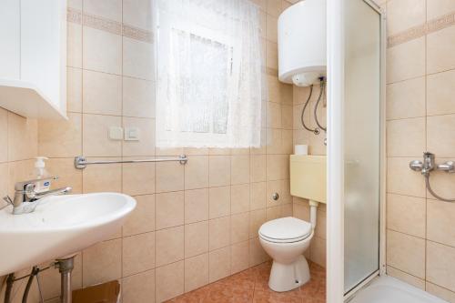 Kúpeľňa v ubytovaní Studio KSENIJA