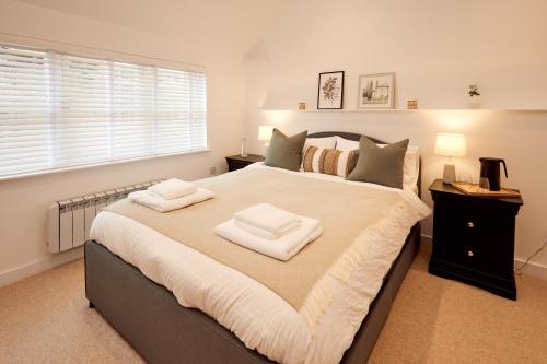 Ένα ή περισσότερα κρεβάτια σε δωμάτιο στο Norton Studio