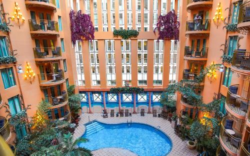 an overhead view of a building with a swimming pool at Hôtel Palace Royal Centre-Ville Québec par JARO in Quebec City