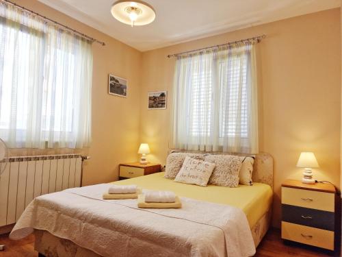 Posteľ alebo postele v izbe v ubytovaní Apartment 3 Sisters