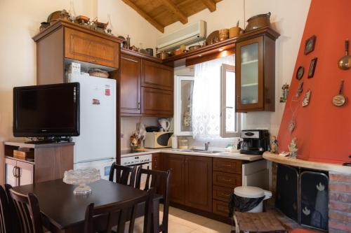 Kuchyňa alebo kuchynka v ubytovaní Casa Max Palaiokastritsa Corfu