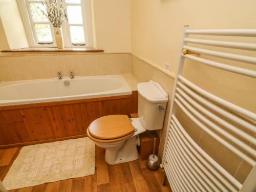 Een badkamer bij Cowstonegill