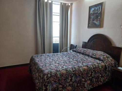 Postel nebo postele na pokoji v ubytování Hotel Gomez de Celaya