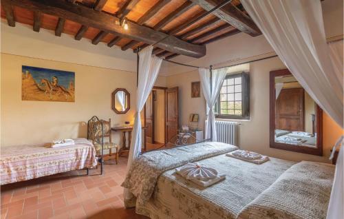 Tempat tidur dalam kamar di Podere La Carraia