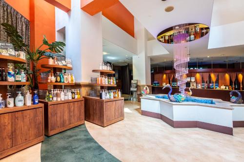 a room with a hair salon with a counter at Fukuoka Chapel Coconuts Hotel Ipolani in Fukuoka