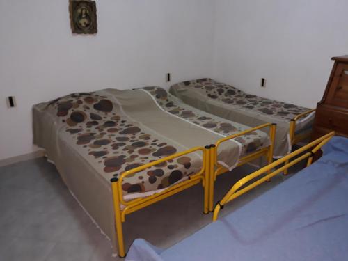 Krevet ili kreveti u jedinici u objektu La Casa di Serra