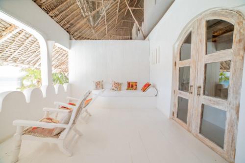 Cama o camas de una habitación en Msambweni Beach House and Private Villas