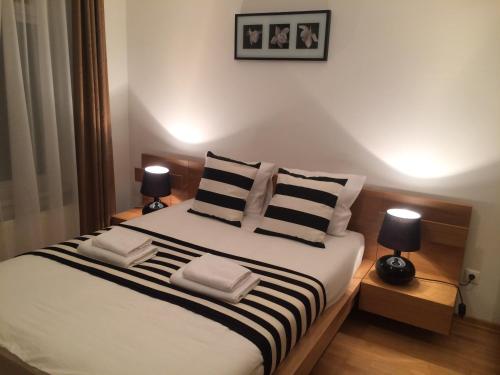 Posteľ alebo postele v izbe v ubytovaní Budapest center Opera apartment