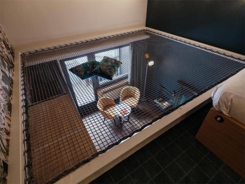 Ein Bett oder Betten in einem Zimmer der Unterkunft National Zermatt - Matterhorn Views, Sunnegga Gateway & SPA