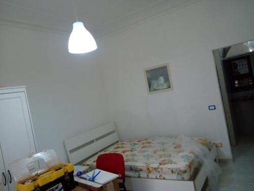 Postel nebo postele na pokoji v ubytování MONOLOCALE FULL OPTIONAL-L I A B E L -CENTRO Corso ITALIA Ragusa
