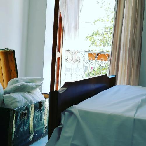 Una cama o camas en una habitación de I Baronetti in centro