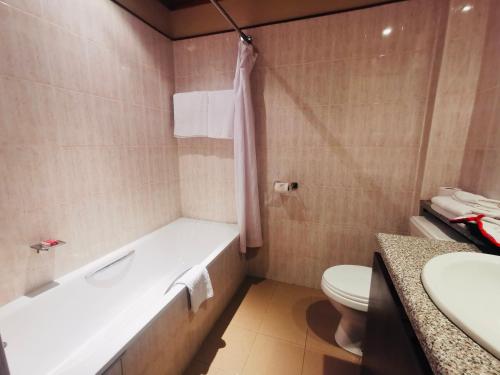 Koupelna v ubytování La Mada Hotel