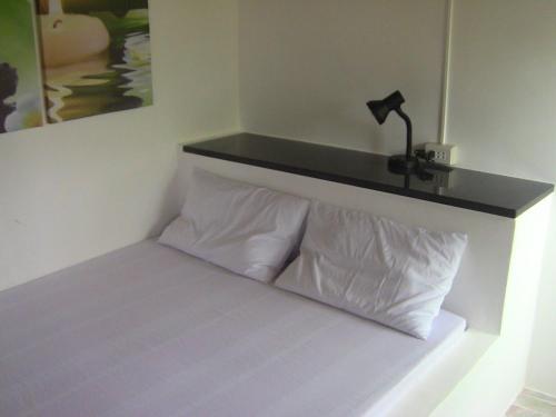 Ein Bett oder Betten in einem Zimmer der Unterkunft Roger's Place Guesthouse