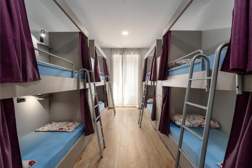 Кровать или кровати в номере Hostel Antique