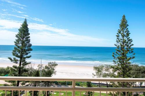 a view of the beach from a balcony at Seacrest Beachfront Apartments Gold Coast in Gold Coast