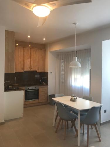 Kuchyň nebo kuchyňský kout v ubytování Apartamento frente al mar