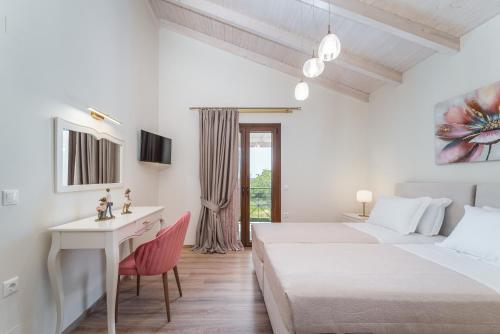 Un pat sau paturi într-o cameră la Vincenzo Suites