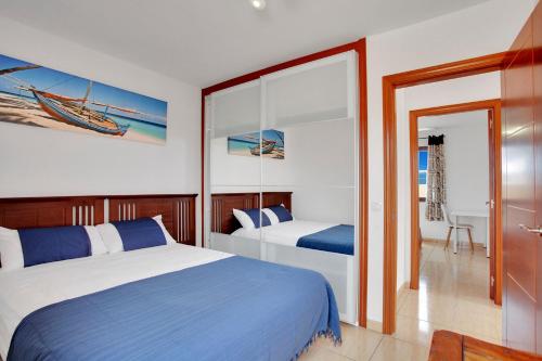 A bed or beds in a room at VILLA SOL