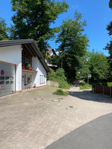an empty driveway in front of a house at Haus Dreil in Ober-Abtsteinach