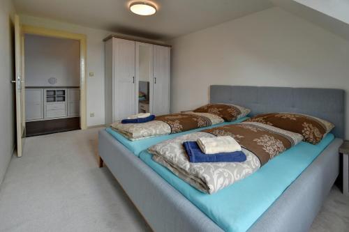 Postel nebo postele na pokoji v ubytování Blatenský House 393
