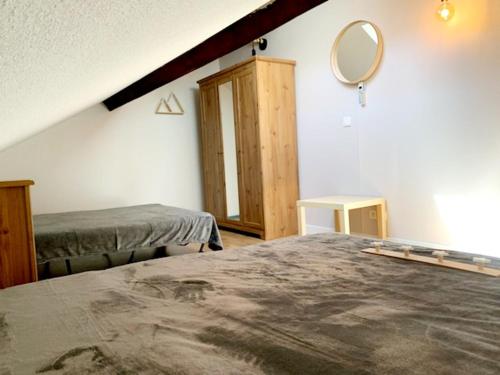 Postel nebo postele na pokoji v ubytování Superbe appartement T3 duplex, Ax les thermes